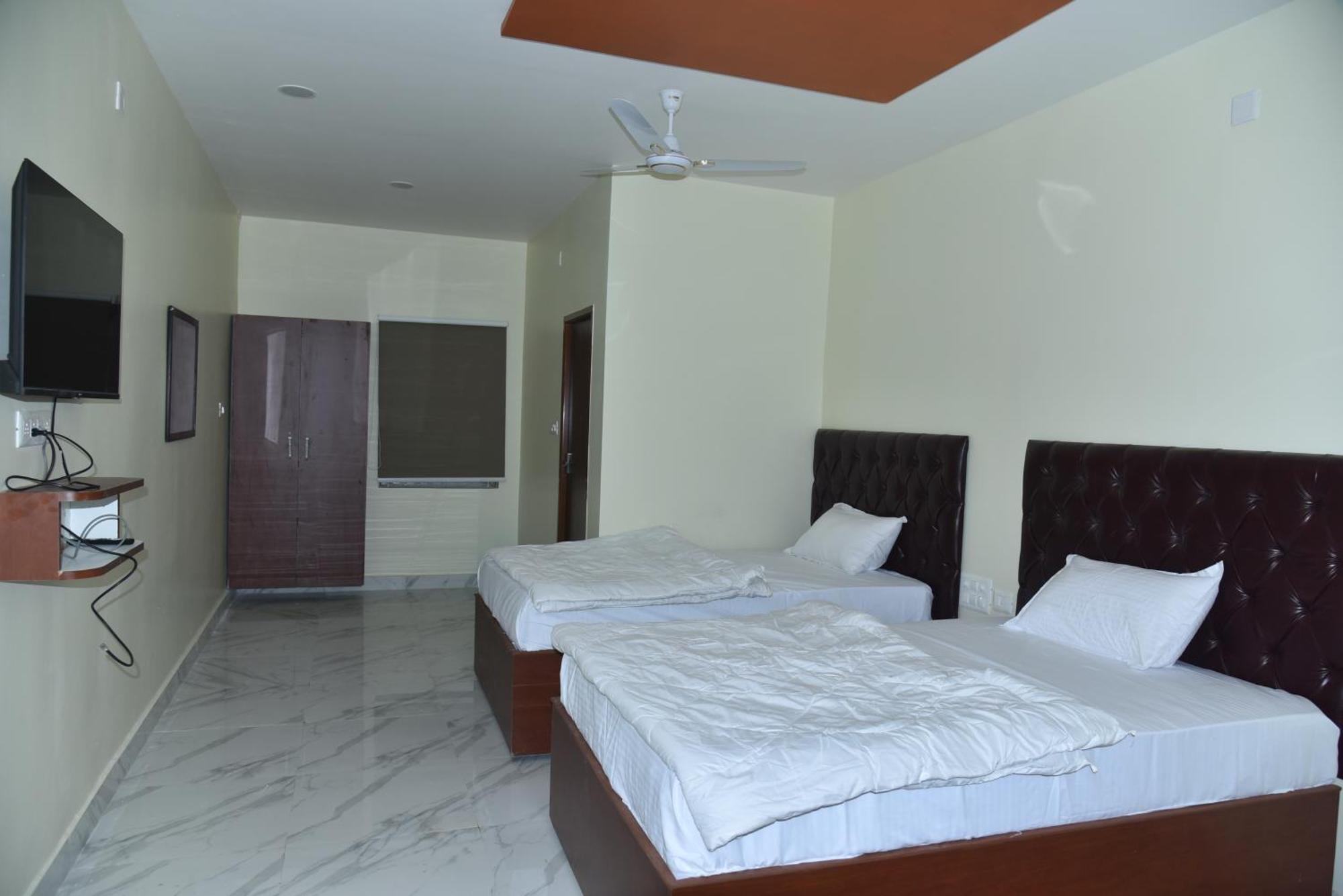 The Paradise Guest Inn Неллуру Экстерьер фото